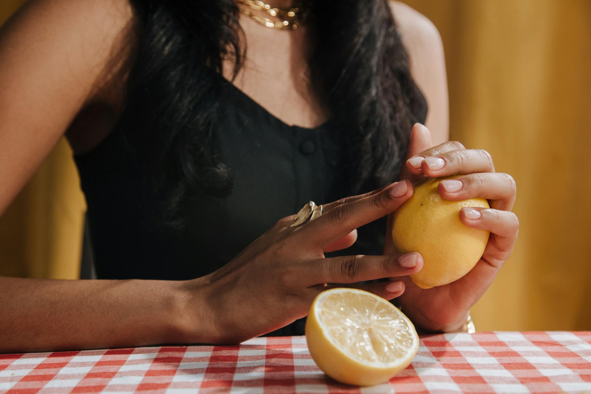 Bright ripe lemons on a pastel background symbolizing quick energy and activation.